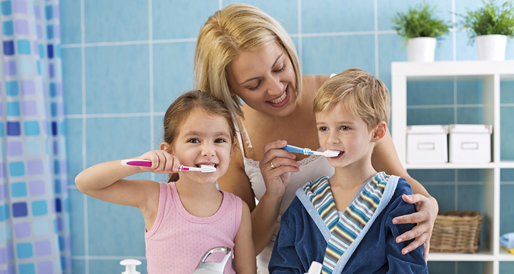 Family brushing teeth