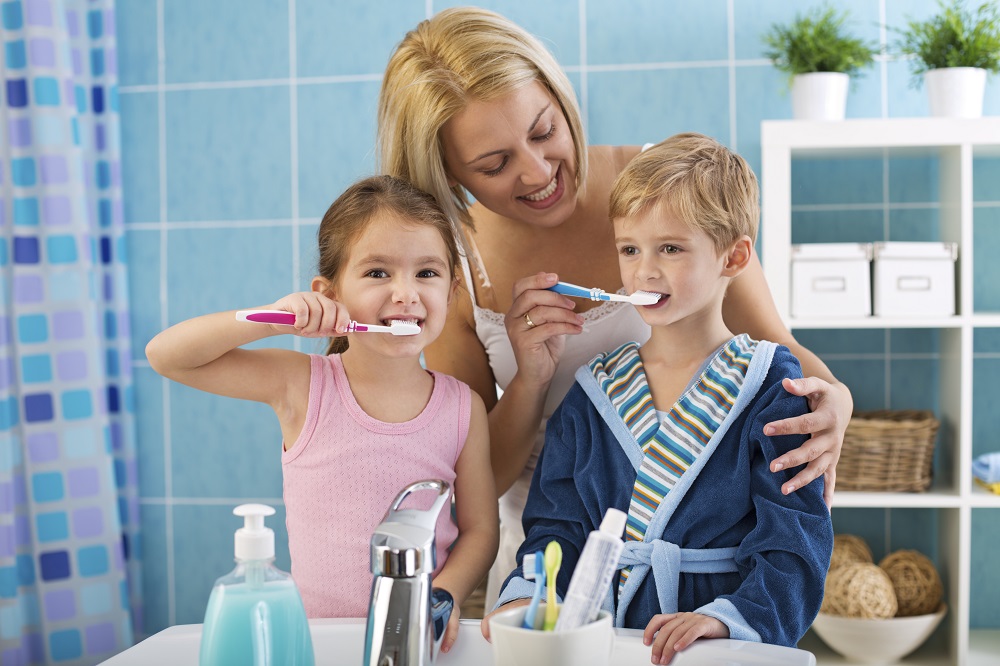 Family brushing teeth