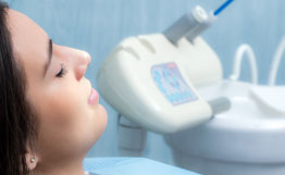 Side view of woman in dental clinic.