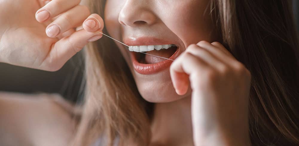 flossing and dental health at home