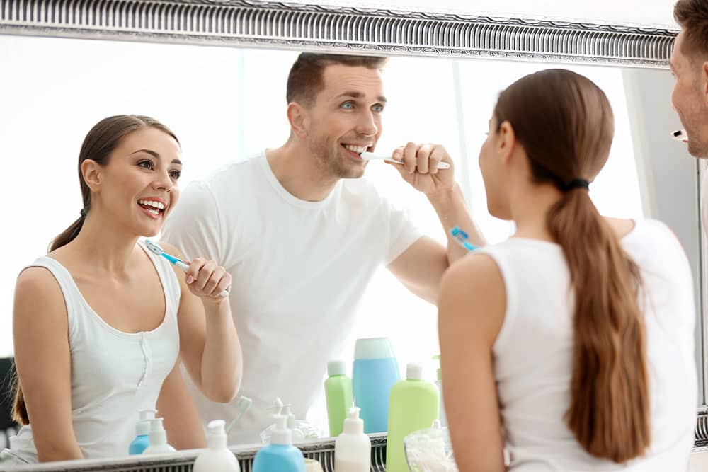 brushing tetth in bathroom