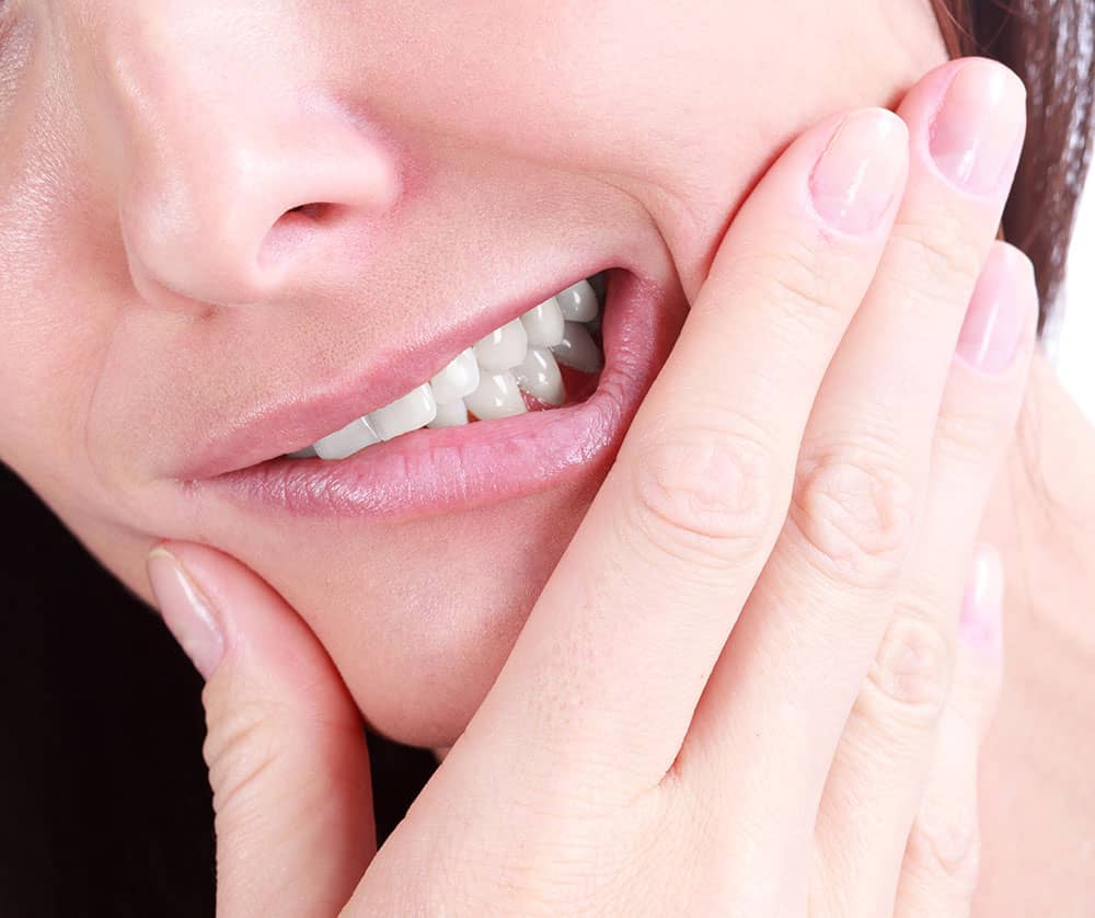 woman with dental pain