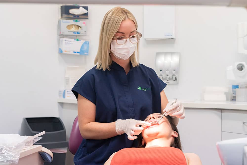 dental assistant with new patient