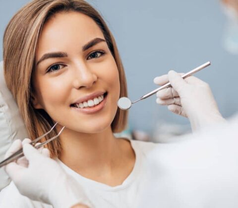 Woman with perfect teeth, dental treatment.