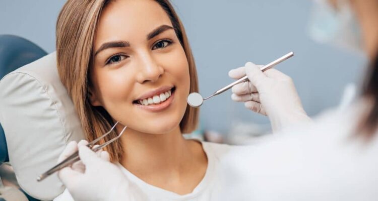 Woman with perfect teeth, dental treatment.