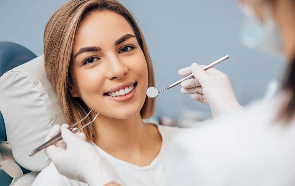 Woman with perfect teeth, dental treatment.