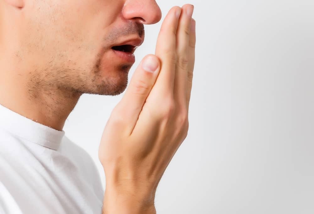 There are a number of possible causes of halitosis, but the vast majority come down to oral hygiene.