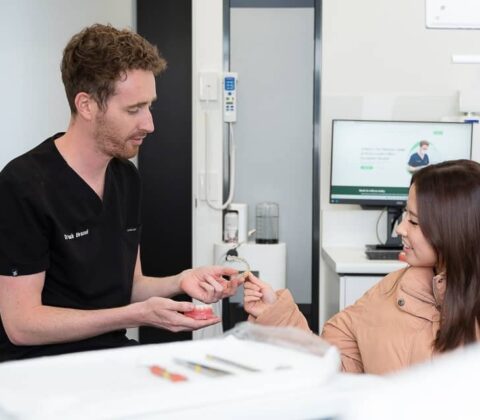 Invisalign aftercare takes care of your Invisalign aligners and teeth once you’ve finished your Invisalign treatment.