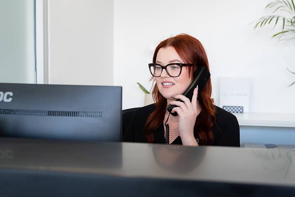 dental assistant on phone