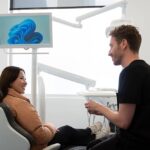 patient in chair with dentist