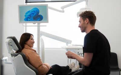 patient in chair with dentist