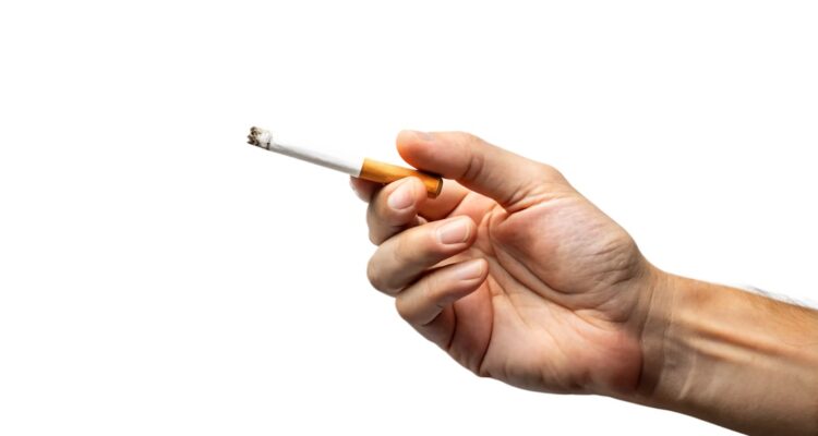 hand holding cigarette