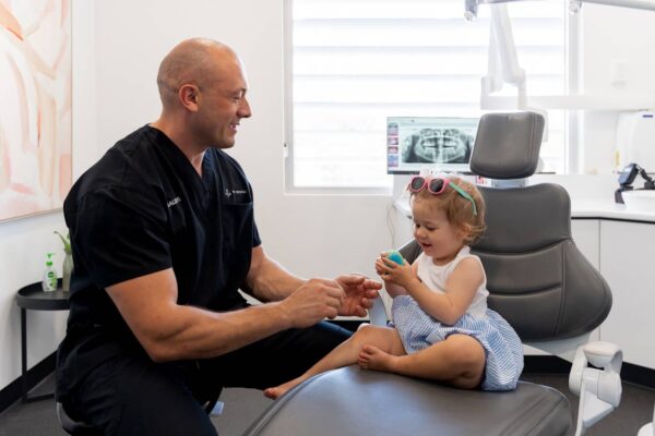 child-dentist-perth child sitting on dental seat
