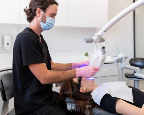 teeth-whitening-perth dentist doing professional teeth whitening