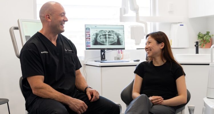 dentist talking to patient