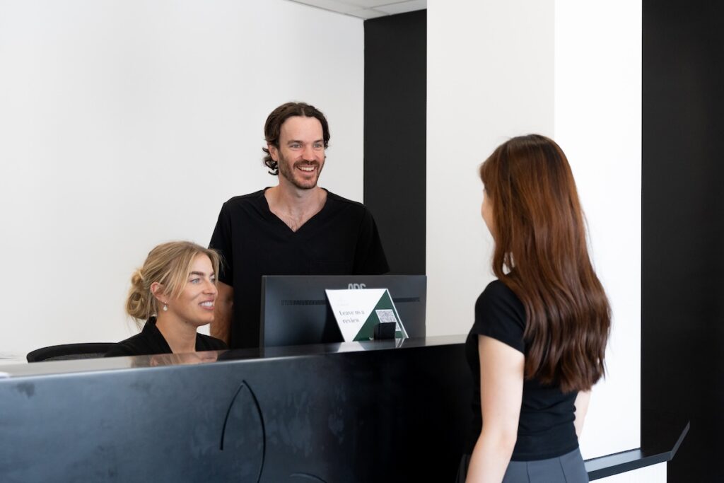 lady booking teeth whitening appointment with 123 Dental Perth